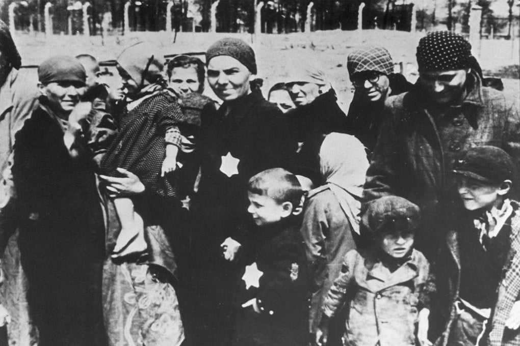 Jewish women and children at Auschwitz concentration camp in Poland, around 1943, during the selection process. Many people were immediately sent by Hitler’s Nazis to the gas chambers. Photo: via Getty Images