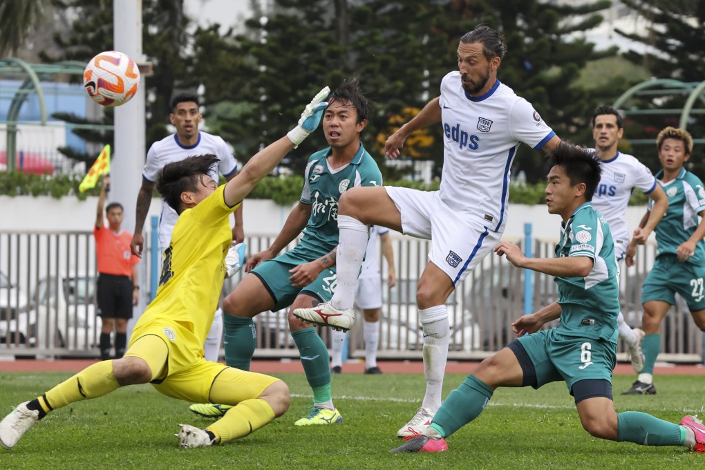 Wofoo Tai Po goalkeeper Tse Ka-wing thwarts Kitchee’s Dejan Danjanovic. Photo: Edmond So