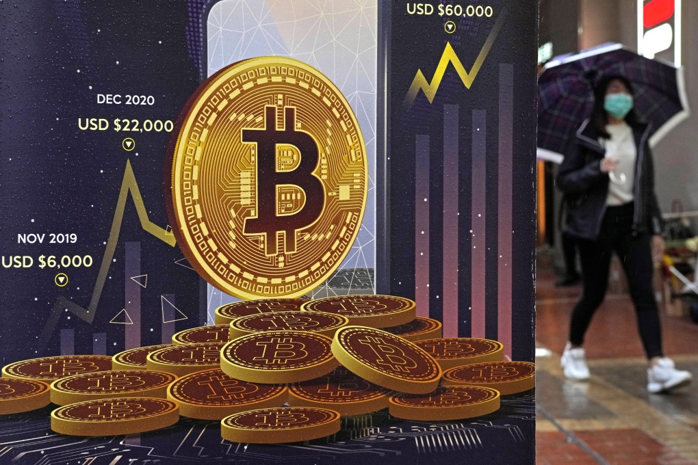 An advertisement for bitcoin is displayed on a street in Hong Kong on February 17, 2022. Photo: AP
