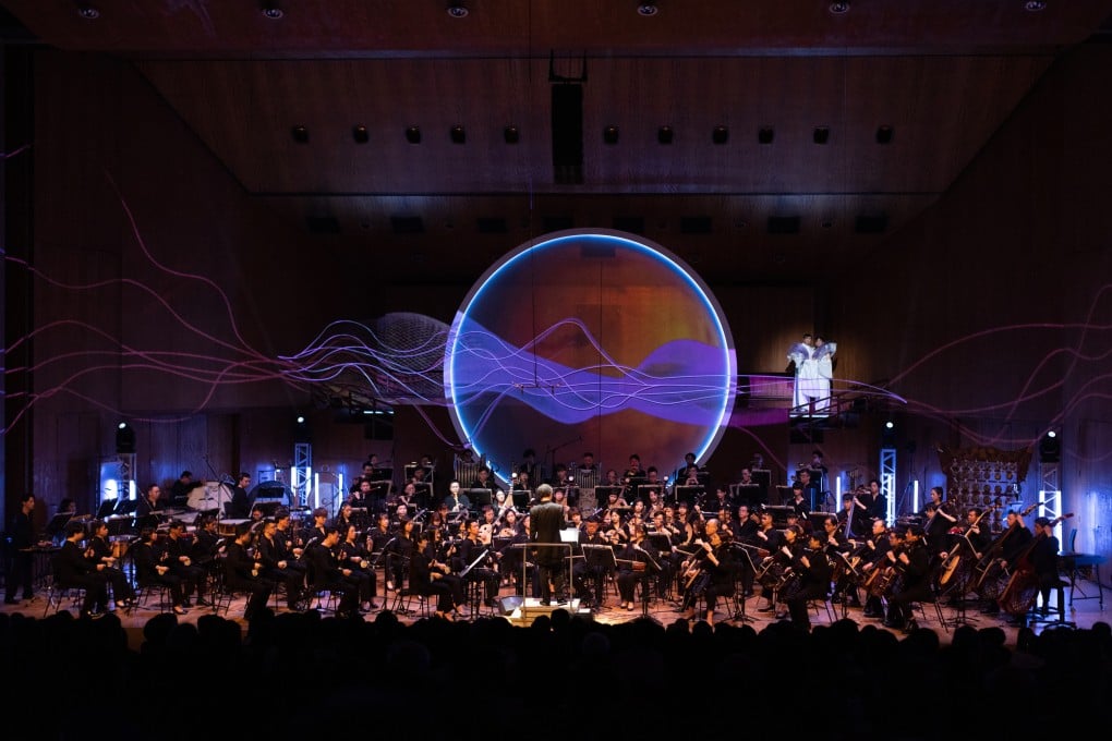 The Hong Kong Chinese Orchestra performing “The Stage Door on Mars” at the Hong Kong City Hall Concert Hall as part of the 2023 Hong Kong Arts Festival, with Man Wah and Leung Fei-tung (on elevated stage) singing arias from famous Cantonese operas. Photo: HKCO