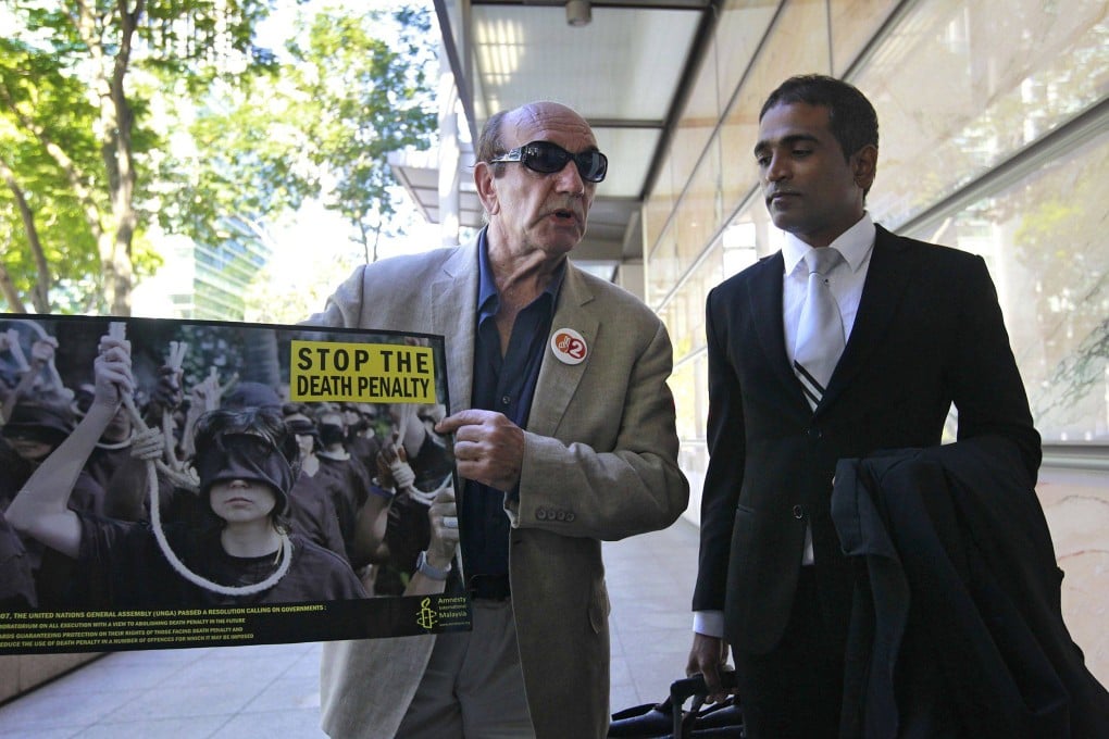 Singapore lawyer M. Ravi (right) was also suspended for a year in 2007 for being disrespectful to a judge. File photo: AFP/Straits Times