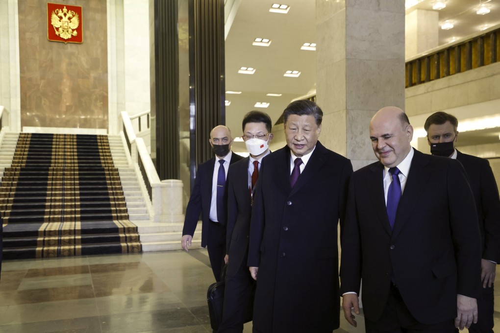 Russian Prime Minister Mikhail Mishustin and Chinese President Xi Jinping walk after their talks in Moscow. Xi extended an invitation to Russian President Vladimir Putin for this year’s Belt and Road Forum. Photo: AP