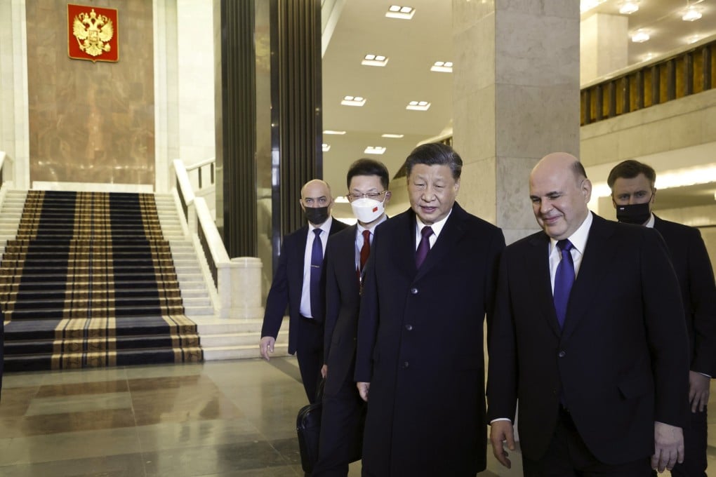 Russian Prime Minister Mikhail Mishustin and Chinese President Xi Jinping walk after their talks in Moscow. Xi extended an invitation to Russian President Vladimir Putin for this year’s Belt and Road Forum. Photo: AP