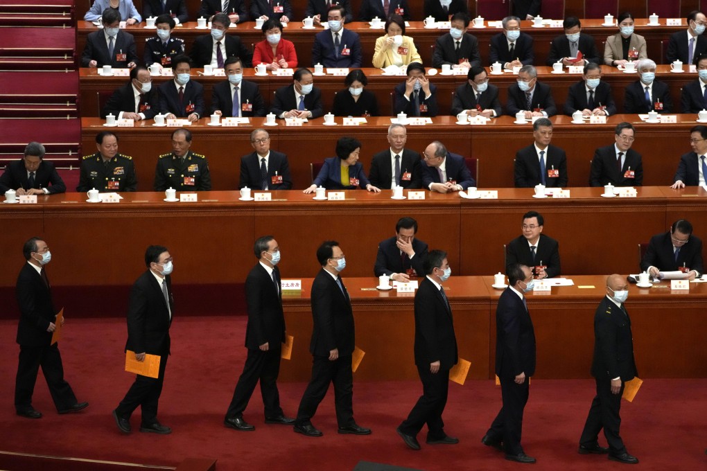 Delegates line up to cast their votes during a session of China’s top legislative body, the National People’s Congress. Photo: AP