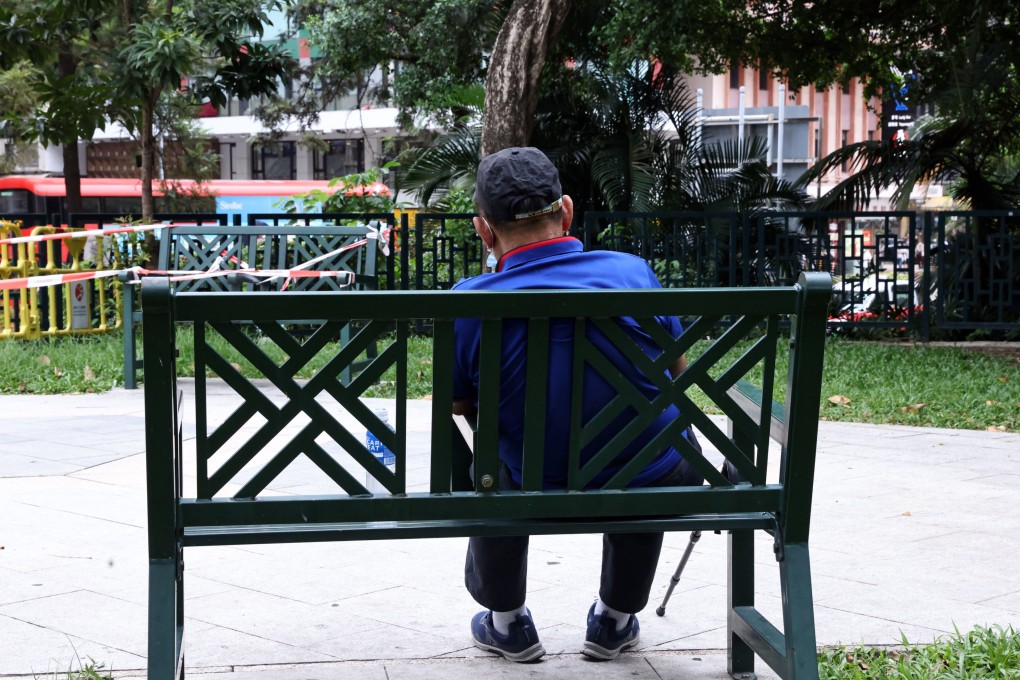An elderly person sits in a public garden in Hong Kong’s Jordan district on October 10, 2022. Photo: K.Y. Cheng