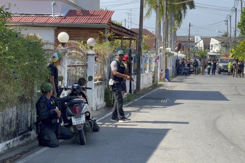 Police near a gunman’s house in Phetchaburi province, southwest of Bangkok, Thailand, on Wednesday, March 22, 2023. Photo: AP