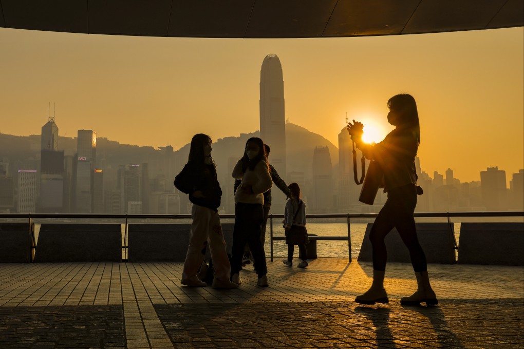 People visiting the Tsim Sha Tsui waterfront at sunset in December. Photo: Jelly Tse