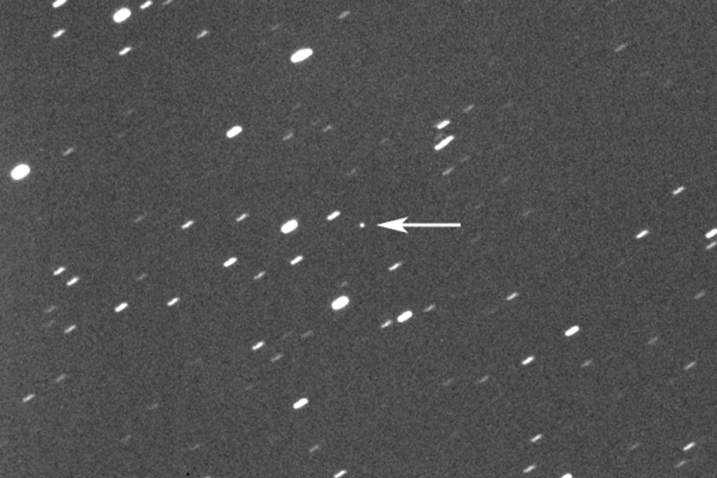 Asteroid 2023 DZ2, indicated by the arrow, will harmlessly zip between Earth and the moon. Photo: Gianluca Masi/Virtual Telescope Project via AP
