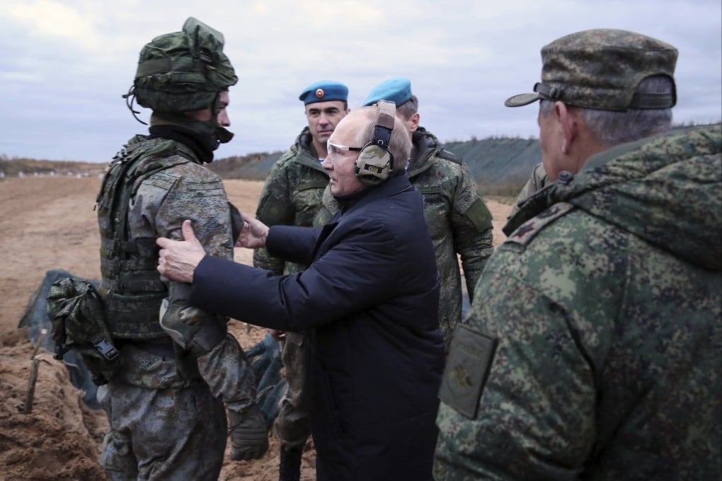 President Vladimir Putin speaks to a soldier at a training centre for mobilised reservists in Russia’s Ryazan region. File photo: Sputnik via AP