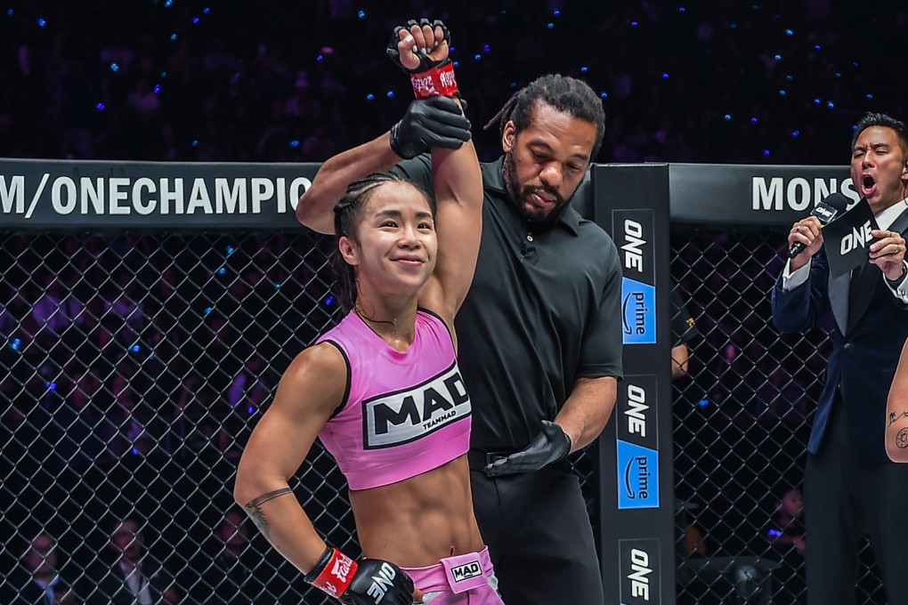Referee Herb Dean raises Ham Seo-hee’s hand after her decision win over Itsuki Hirata at Fight Night 8 in Singapore. Photo: ONE Championship