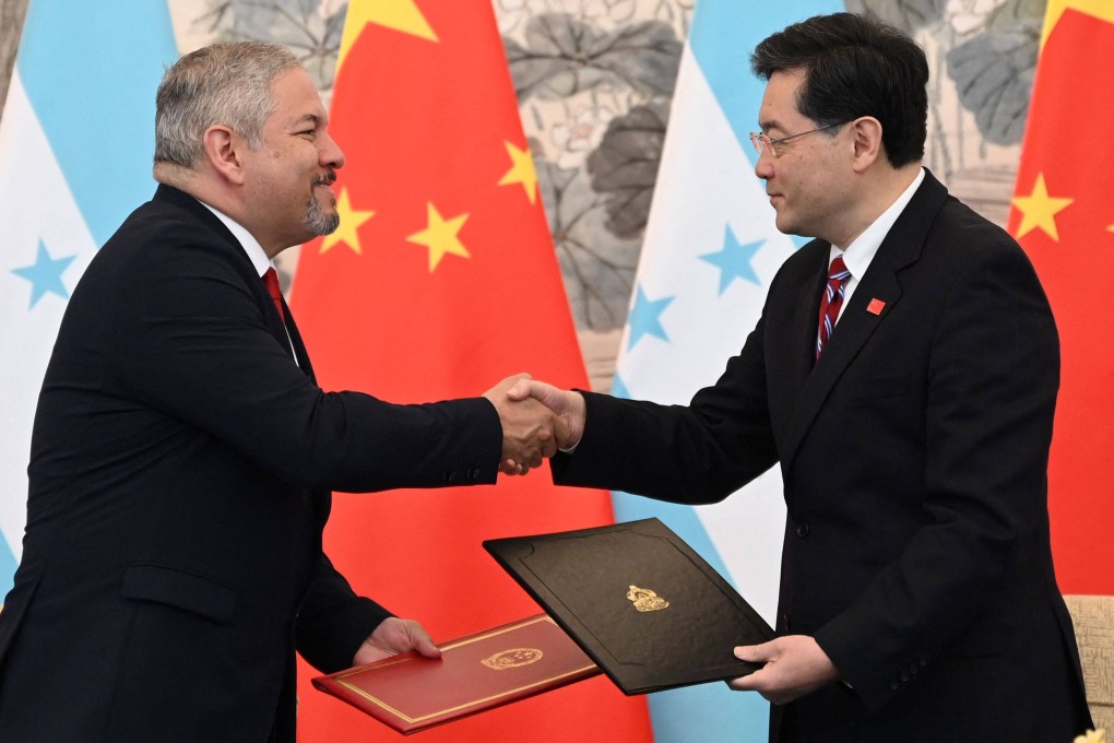 Chinese Foreign Minister Qin Gang with Honduran counterpart Eduardo Enrique Reina after the signing ceremony in Beijing on Sunday. Photo: AFP