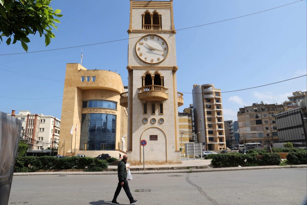 A clock tower in Beirut’s Jdeideh district indicates the time on Sunday after Lebanon’s government announced a decision to delay daylight savings.Photo: AFP