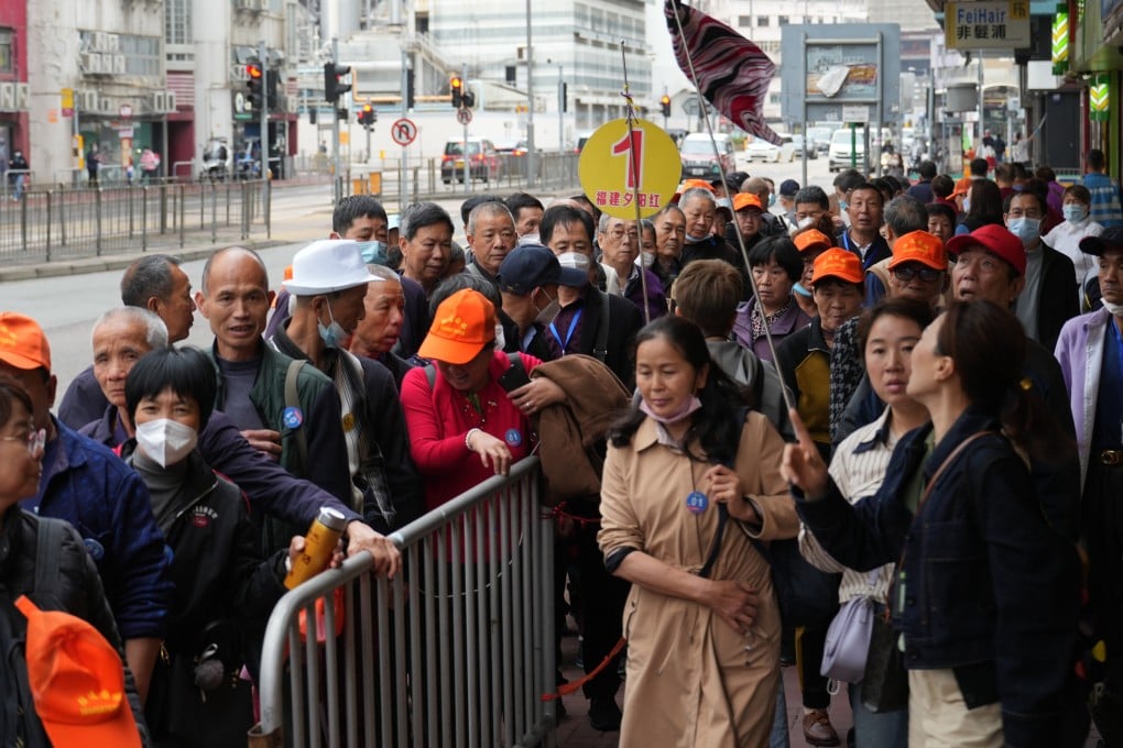 Dozens of mainland tourists outside a restaurant in Hong Kong. Such crowds have drawn the ire of residents. Photo: Sam Tsang