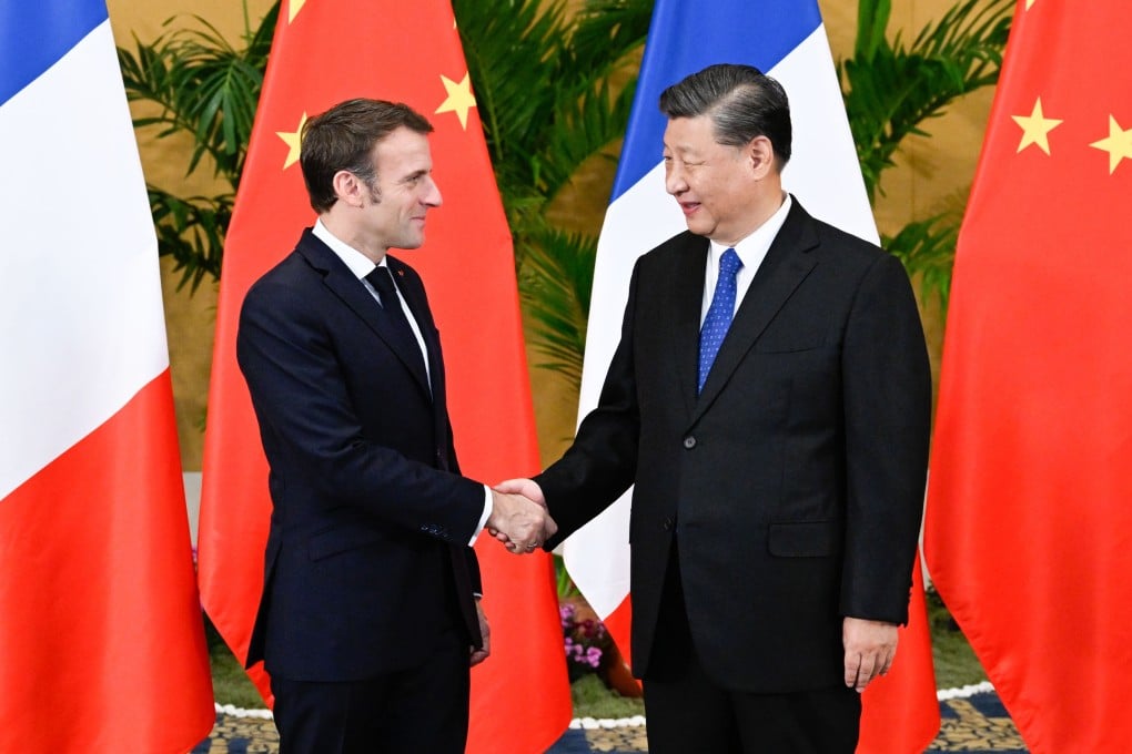 French President Emmanuel Macron greeting Chinese leader Xi Jinping in Bali, Indonesia, on November 15. Macron is scheduled to go to Beijing for another meeting next week. Photo: Xinhua