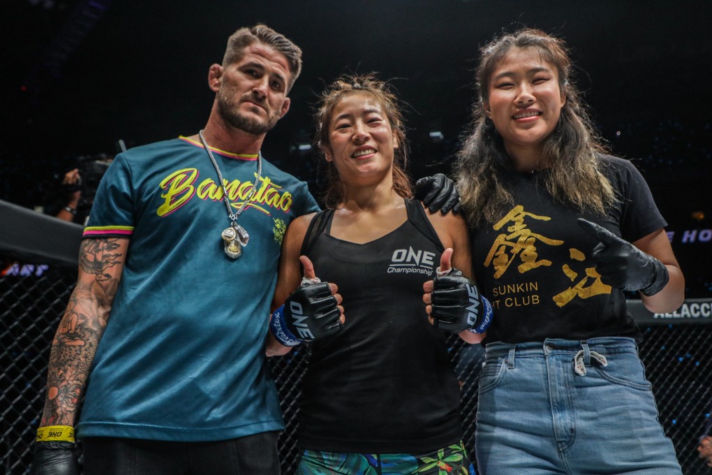 Meng Bo (centre) celebrates with her coach George Hickman (left) and teammate Wu Yanan. Photos: ONE Championship