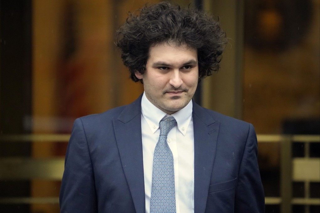 FTX founder Sam Bankman-Fried leaves a federal courthouse in New York on February 16. He is accused in a new indictment of paying a US$40 million bribe to unlock frozen crypto in China. Photo: AP