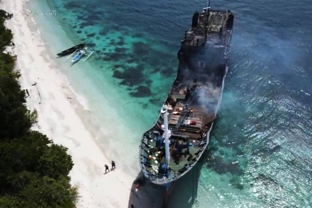 The burnt passenger ferry Lady Mary Joy 3 after it was towed to the shores of the southern Philippines. Photo: AFP
