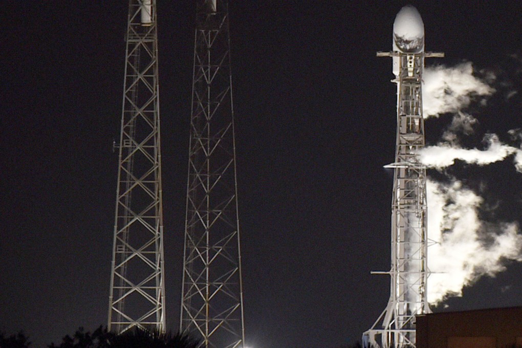 A SpaceX Falcon 9 rocket prior to launch from Cape Canaveral in the US carrying a Japanese lunar lander and lunar rover and a rover built by the United Arab Emirates. Photo: Paul Hennessy/Anadolu Agency via Getty Images