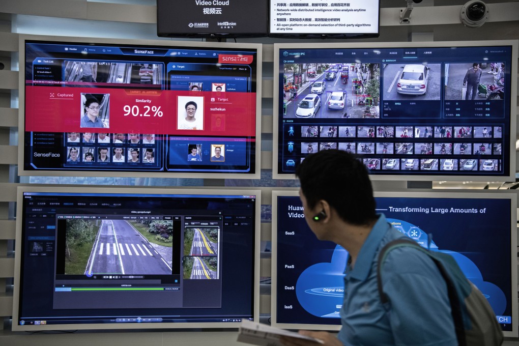 A display showing AI-driven facial recognition software in action is seen in Shenzhen, China. Photo: Getty Images