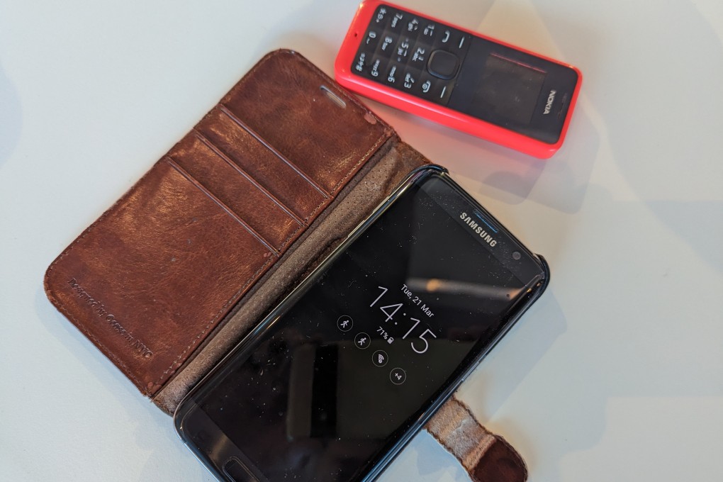 Writer Fionnuala McHugh has flirted with her two phones, a Samsung and a Nokia, since 2014, but still refuses to commit to either relationship, often dropping one or the other. Photo: Kevin Kwong