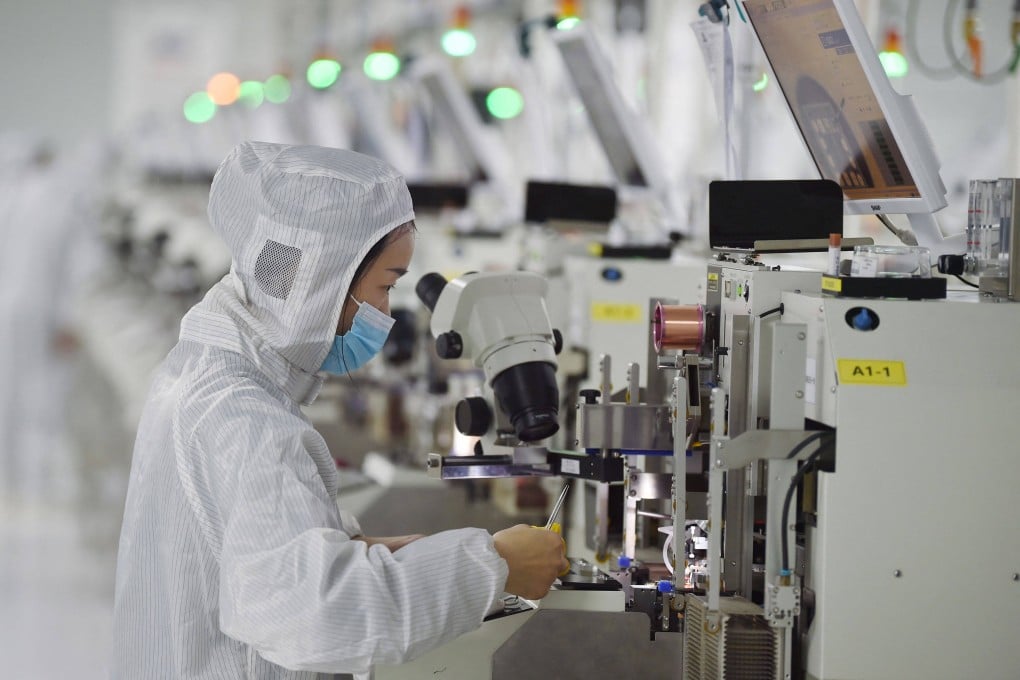 A worker producing semiconductor chips at a factory in Suqian, China’s eastern Jiangsu province. Photo: AFP