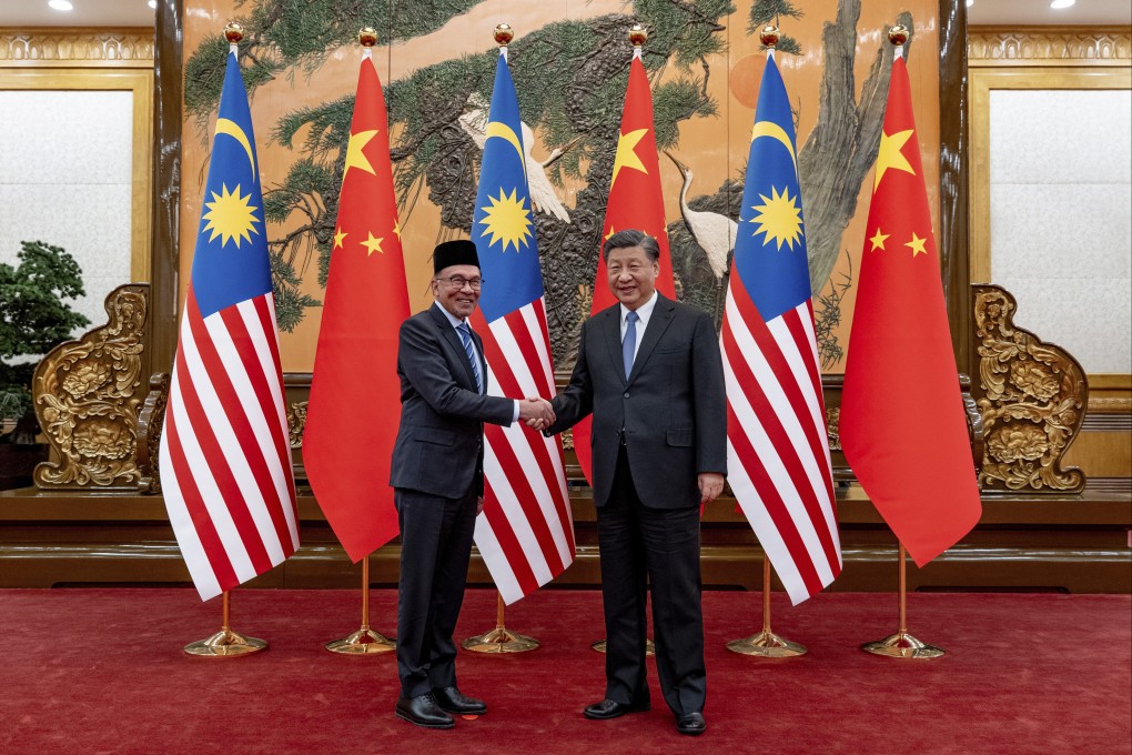 Malaysian Prime Minister Anwar Ibrahim (left) meets  Chinese President Xi Jinping at the Great Hall of the People in Beijing on Friday. Photo: Prime Minister’s Office of Malaysia via AP