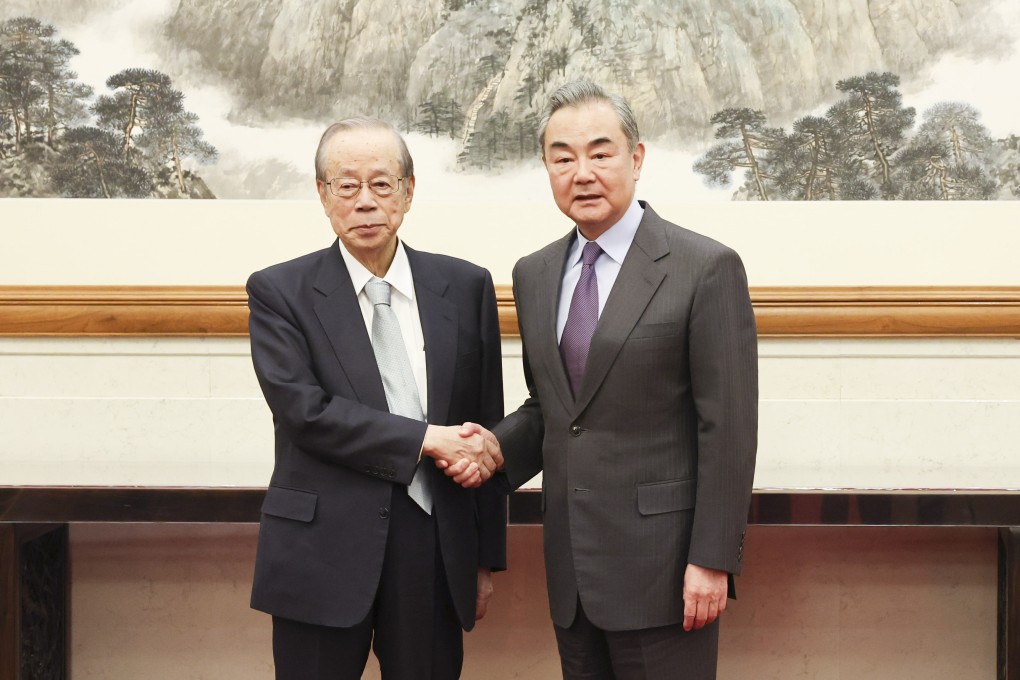 Top diplomat Wang Yi meets former Japanese prime minister Yasuo Fukuda in Beijing on Friday. Photo: Xinhua