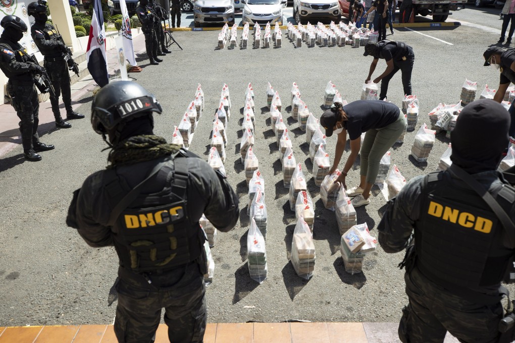 Agents for the National Directorate for Drug Control of the Dominican Republic guard 2,188 one-kilo packages of cocaine in Santo Domingo, Dominican Republic on Saturday. Photo: EPA-EFE