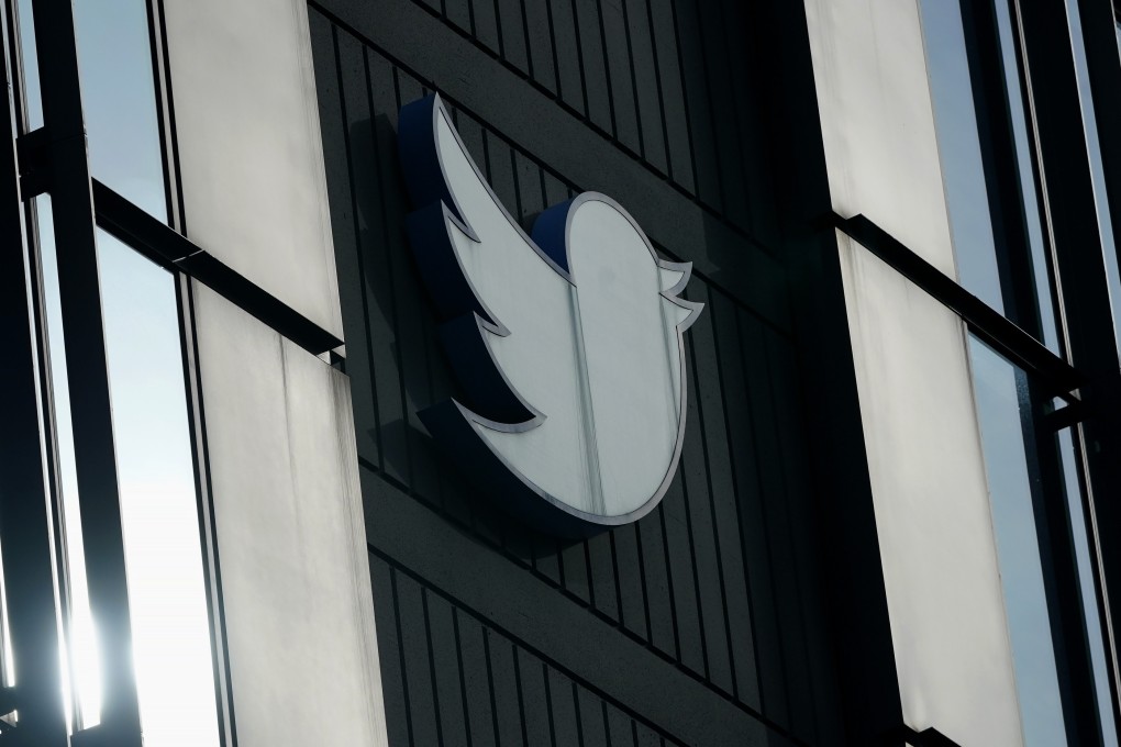 A Twitter logo hangs outside the company’s offices in San Francisco. Photo: AP/File