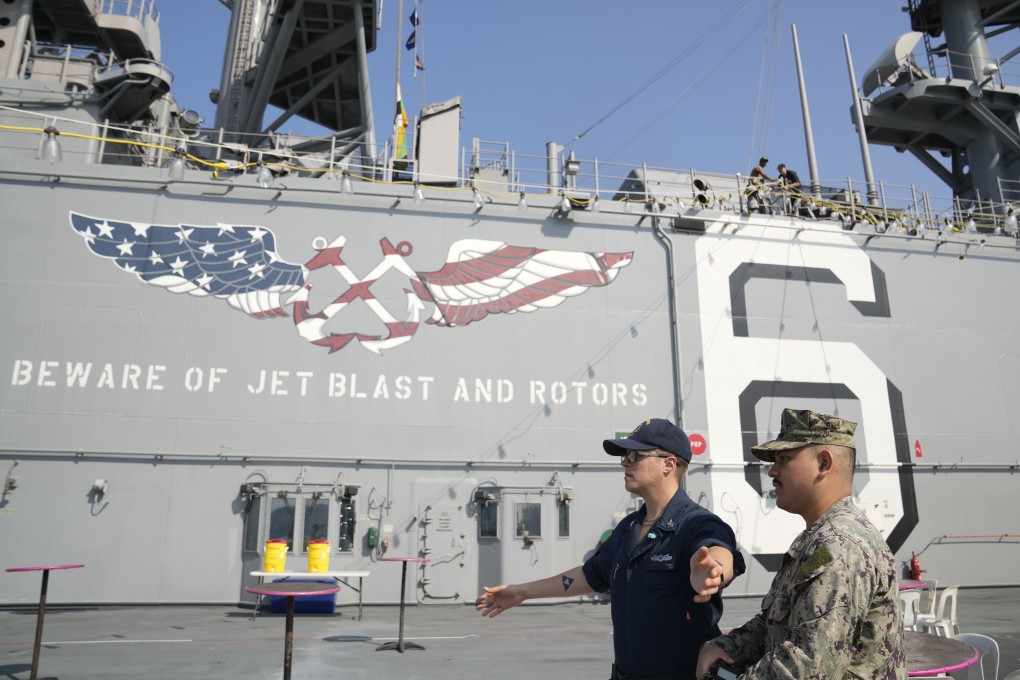 US Marines and Navy personnel at the flight deck of the USS America during a scheduled port visit in Manila, Philippines on March 21, 2023. Photo: AP