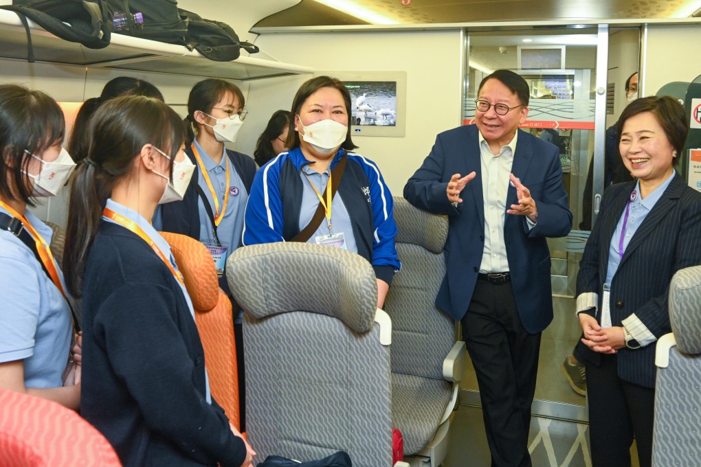Chief Secretary for Administration Eric Chan sees off the first batch of senior secondary students leaving on a study tour to mainland China. Photo: Handout