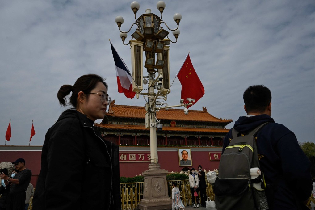 The national flags of France and China flutter near Tiananmen Gate as French President Emmanuel Macron (not in photo) arrives in Beijing on April 5. Photo: AFP