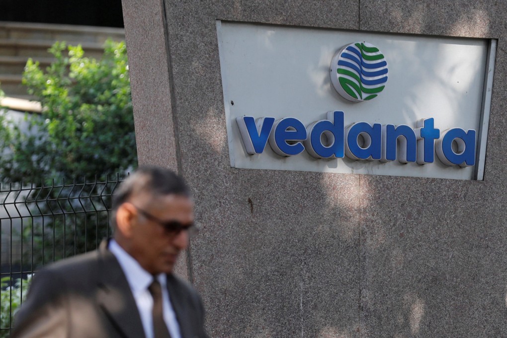 A man walks past the logo of Vedanta outside the firm's headquarters in Mumbai, India. Photo: Reuters