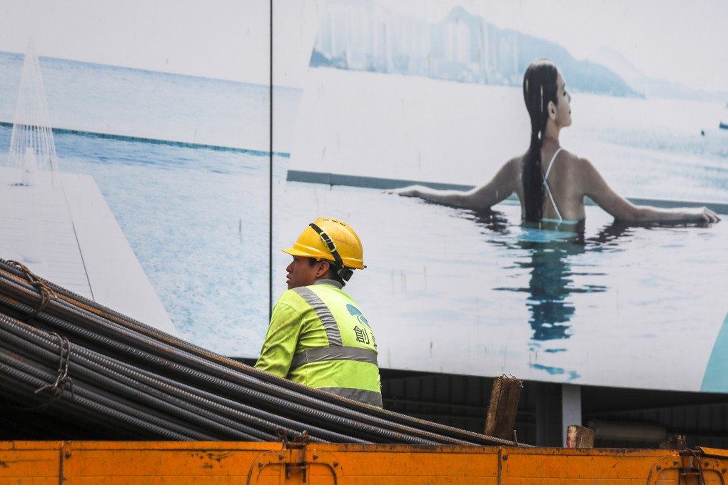 A construction worker is seen in Yau Tong on June 13. The manpower shortage in the construction industry is a long-standing problem that no government has been able to tackle successfully. Photo: Xiaomei Chen