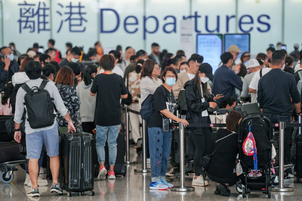 The Hong Kong International Airport is crowded with travellers leaving the city. Photo: Elson Li