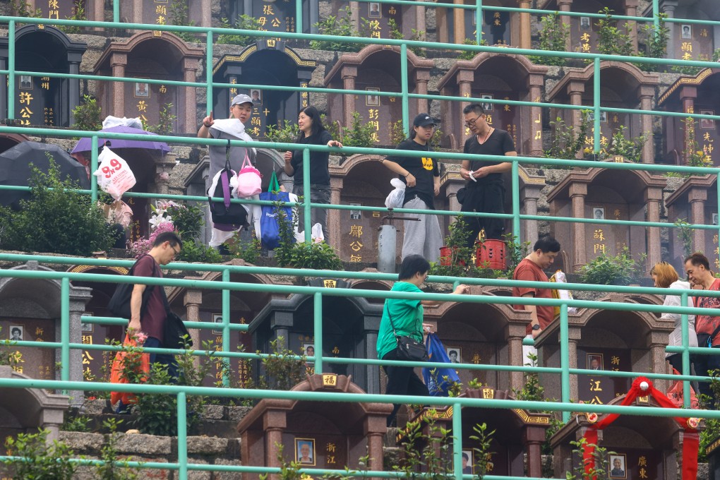 Families honor the dead at Junk Bay Chinese Permanent Cemetery in Tseung Kwan O through tomb-sweeping and the burning of paper offerings. Photo: Dickson Lee