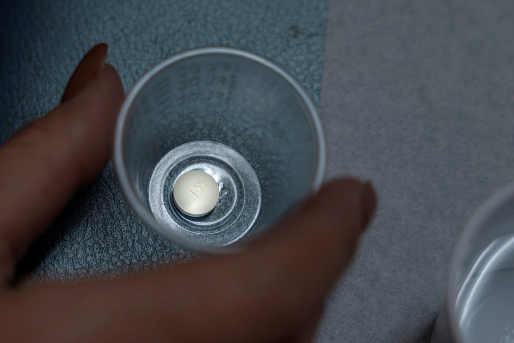 A patient prepares to take mifepristone, the first pill given in a medical abortion, at the Women’s Reproductive Clinic of New Mexico in Santa Teresa in January. Photo: Reuters