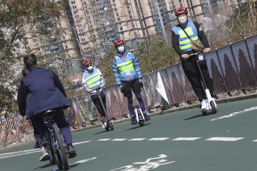Transport Department staff test electric scooters and other devices on a cycle track in Tseung Kwan O. Photo: K. Y. Cheng