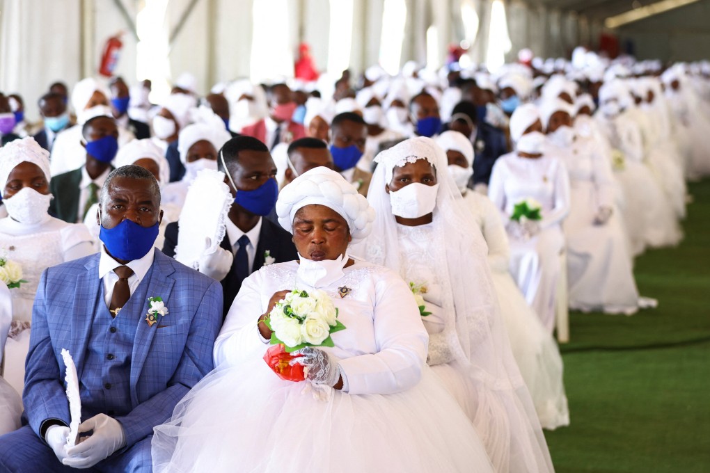 Brides and grooms during a mass wedding ceremony in Kgabalatsane, South Africa on Sunday. Photo: Reuters