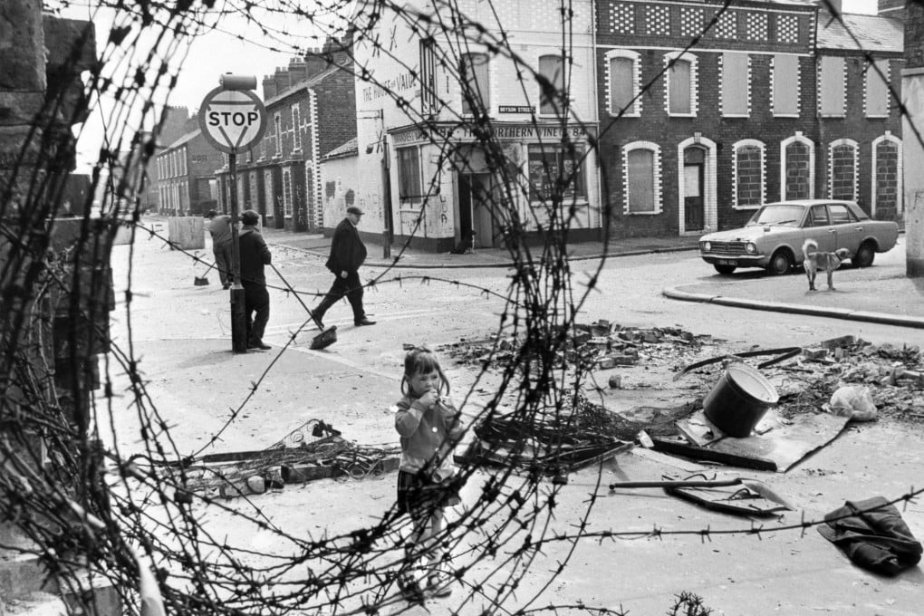 A girl is seen on a street near a roadblock in a Catholic area of Belfast, Northern Ireland’s capital, in 1974. More than 3,500 people were killed during three decades of sectarian conflict over British rule in Northern Ireland, which began in the late 1960s. Photo: AFP