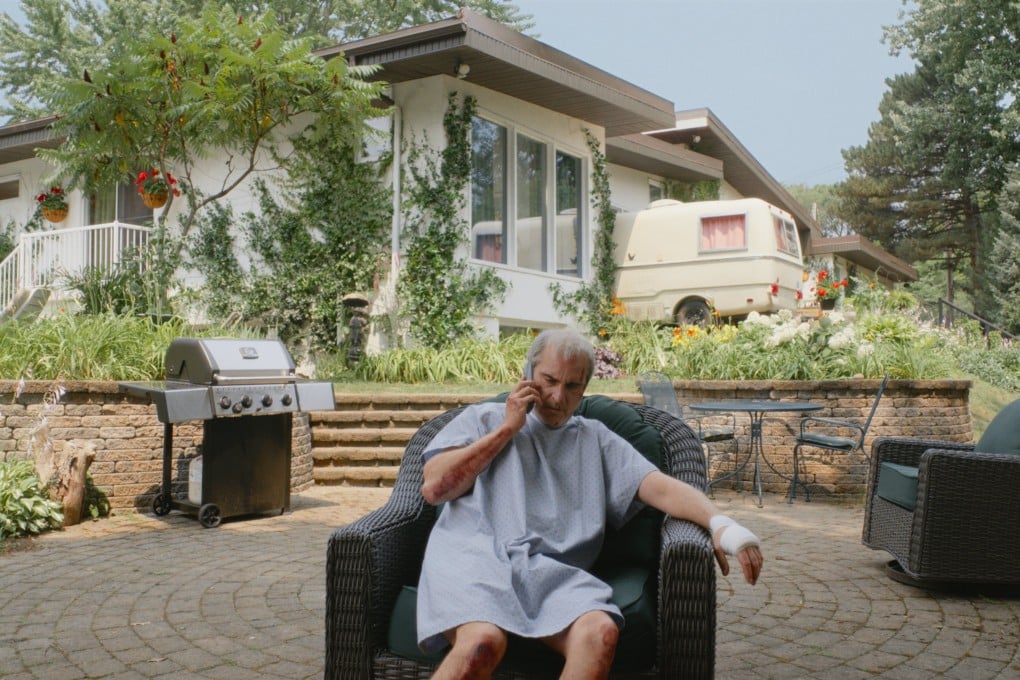 Joaquin Phoenix in a still from Beau Is Afraid, directed by Ari Aster. Parker Posey co-stars.