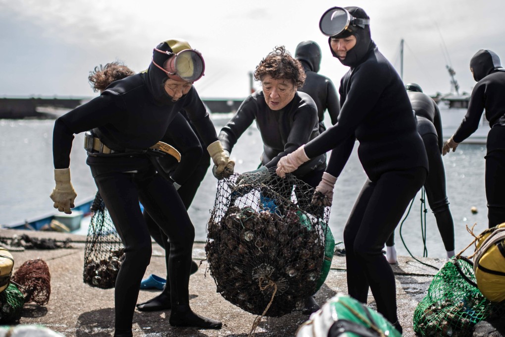 Ama divers submerge to great depths without air tanks to gather abalone, seaweed and other seafood, and sometimes pearls. They exist only in Japan and South Korea. Photo: AFP