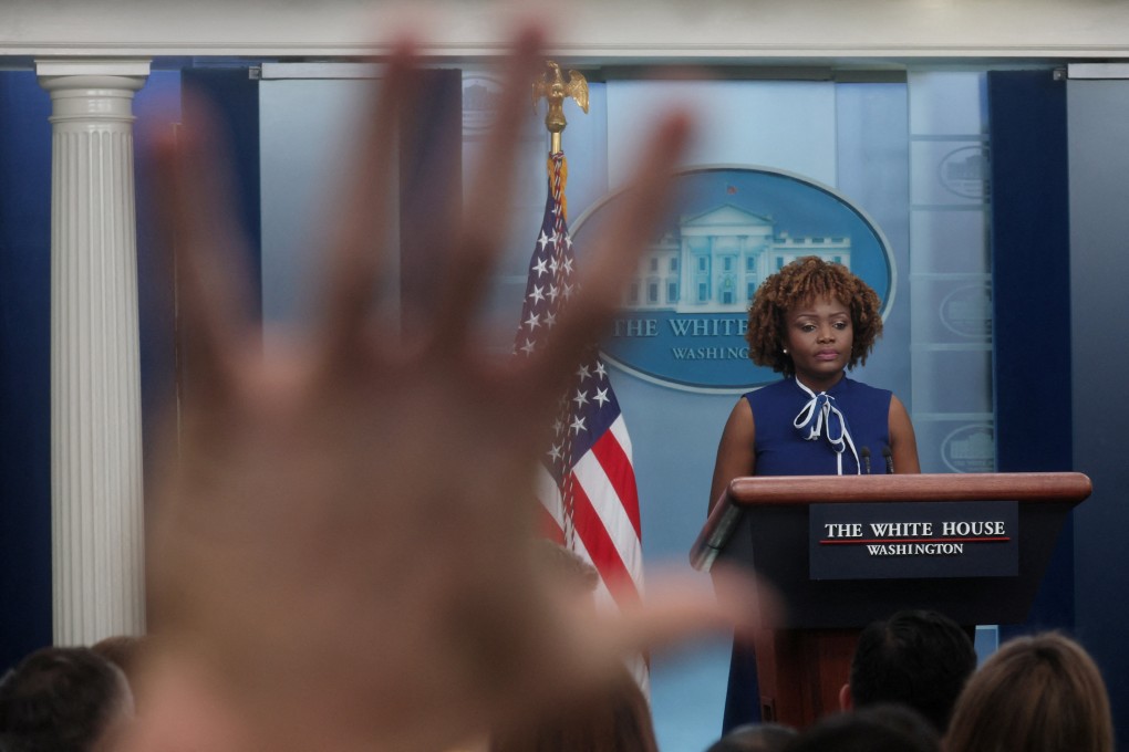 A reporter raises a hand to ask a question as White House Press Secretary Karine Jean-Pierre holds a press briefing at the White House earlier this month. Photo: Reuters