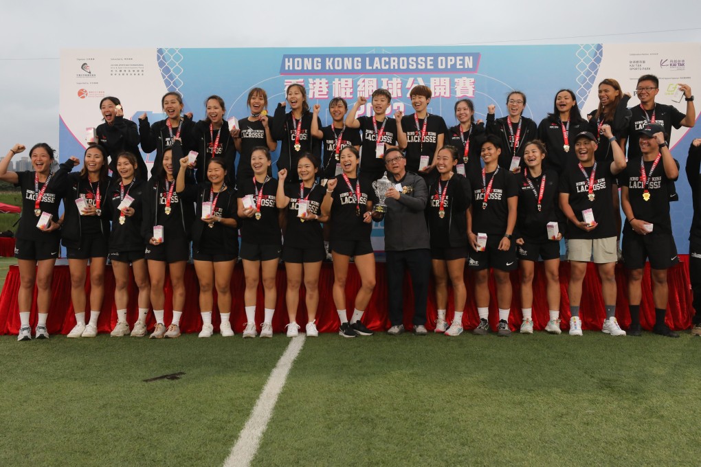 Hong Kong’s women lift the trophy in Tsueng Kwan O on Monday. Photo: Xiaomei Chen