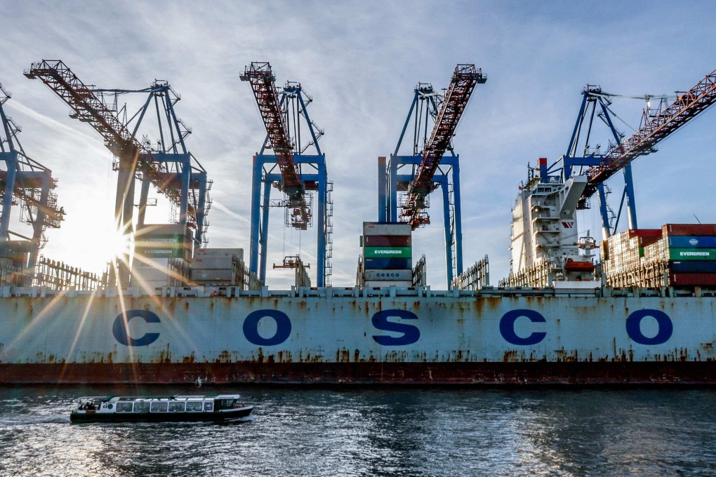 The container ship ‘Cosco Pride’ of China is unloaded at the Tollerort Terminal in Hamburg, northern Germany. Photo: AFP