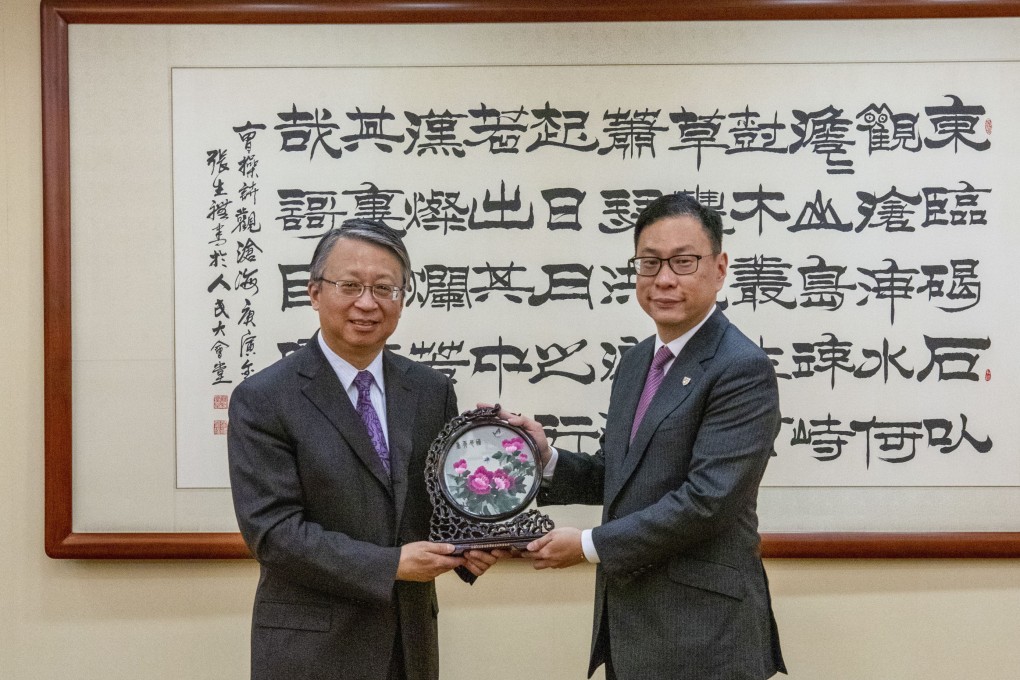 (Left) Shen Chunyao, chairman of the legislative affairs commission of the National People’s Congress Standing Committee, meets Victor Dawes, chairman of the Hong Kong Bar Association. Photo: Handout