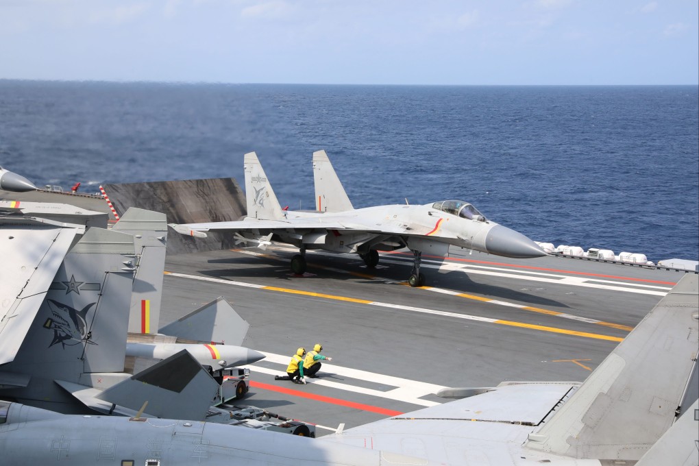 A J-15 fighter gets ready to take off from the aircraft carrier Shandong during PLA exercises around Taiwan. Photo: Xinhua
