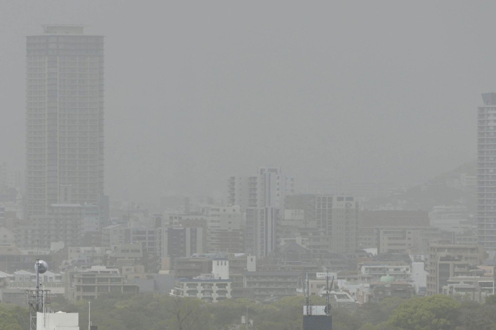 Dust from sandstorms darkens the sky over Fukuoka, southwestern Japan, on April 12. Photo: Kyodo