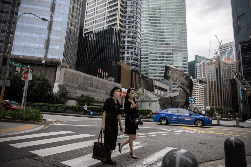 In Singapore, weekly cases topped 28,000 by the end of March, up from 14,467 a week earlier. Photo: EPA-EFE