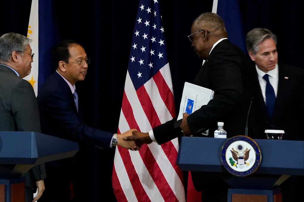 Philippine defence chief Carlito Galvez Jr and US Defence Secretary Lloyd Austin shake hands at the end of a joint press meeting at the State Department with Philippine Secretary of Foreign Affairs Enrique Manalo (left) and US Secretary of State Antony Blinken (right) in Washington on April 11, 2023. Photo: Reuters